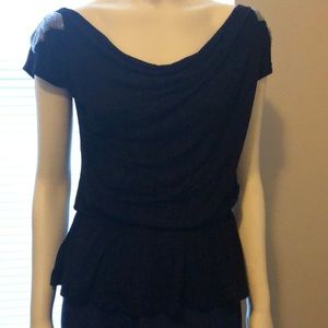 Black top with beading on the shoulder